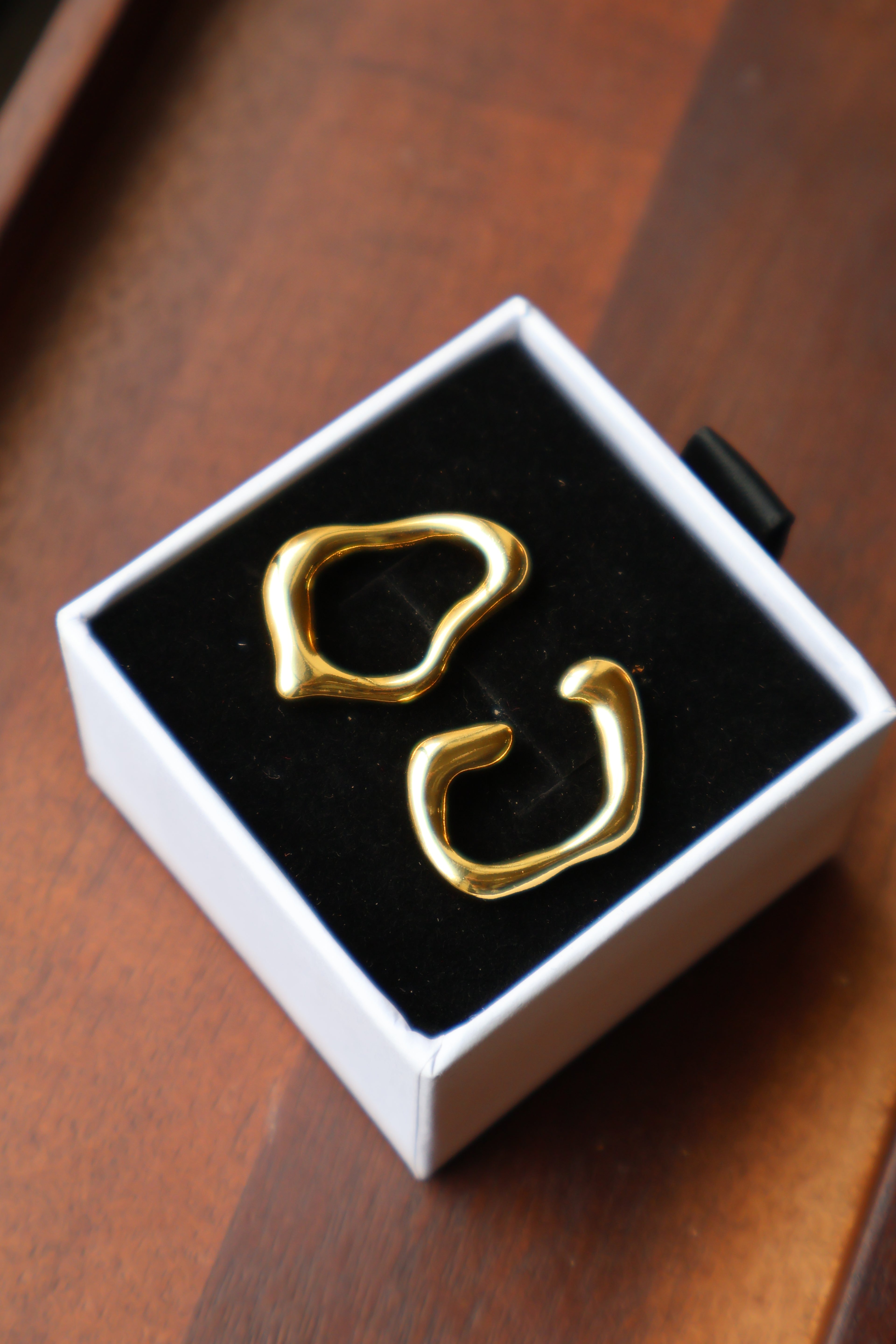 Golden Aura Asymmetrical Stud Earrings