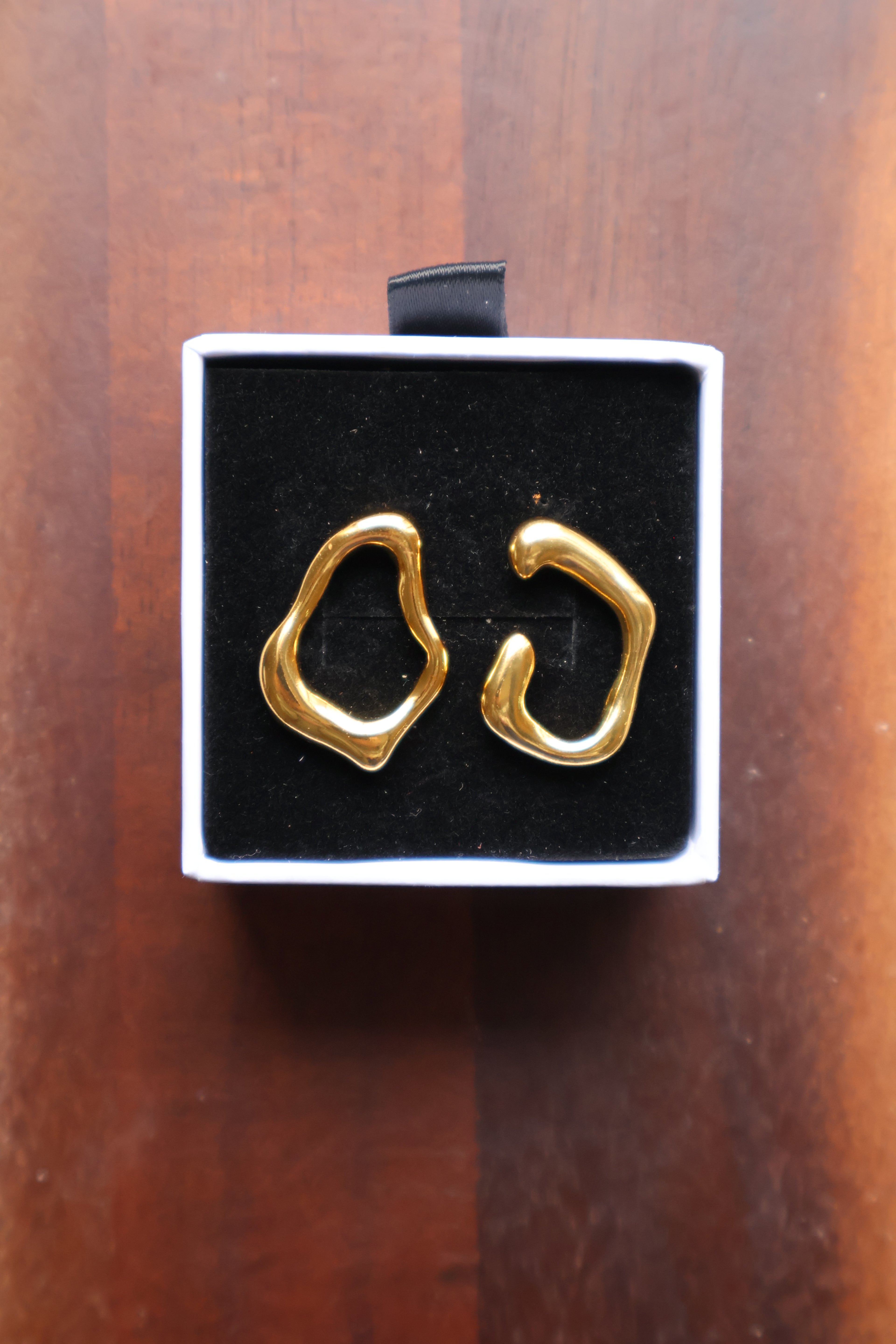 Golden Aura Asymmetrical Stud Earrings