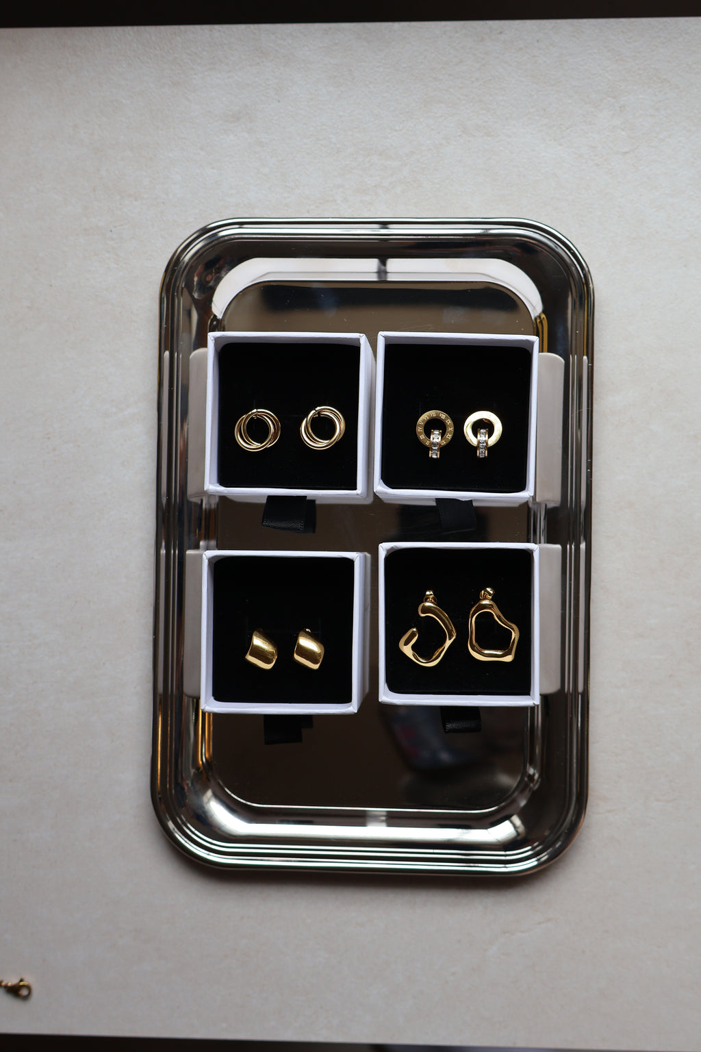 Golden Aura Asymmetrical Stud Earrings