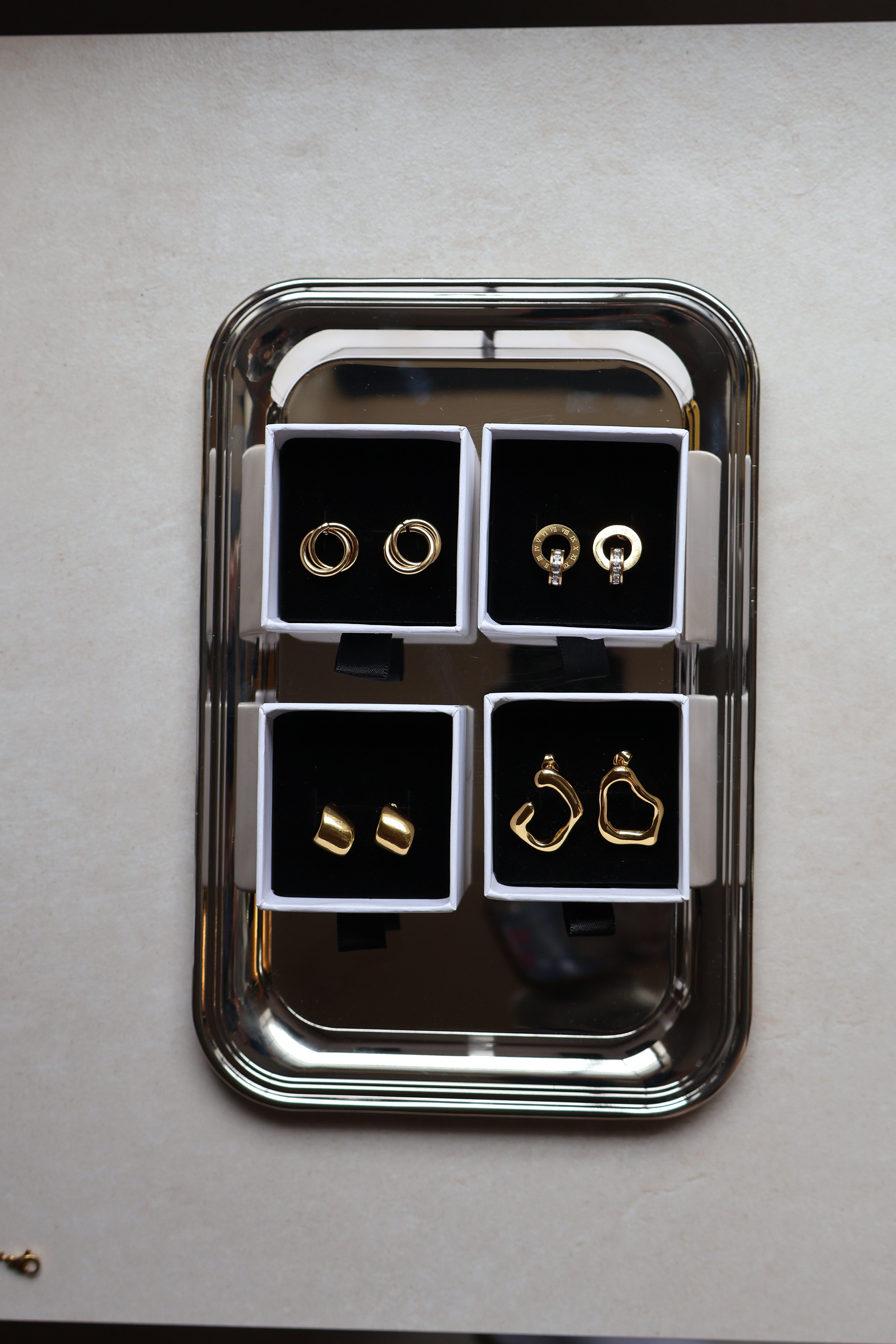 Golden Aura Asymmetrical Stud Earrings