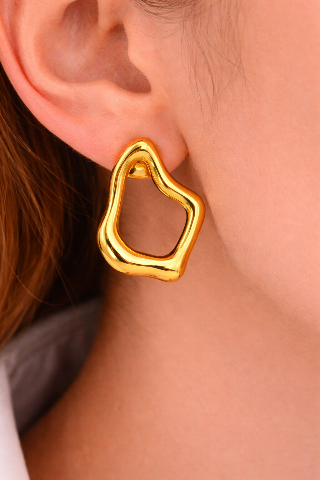 Golden Aura Asymmetrical Stud Earrings